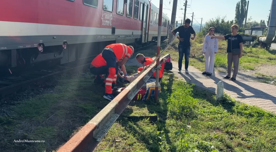 femeie-salvata-din-calea-trenului-la-iasi